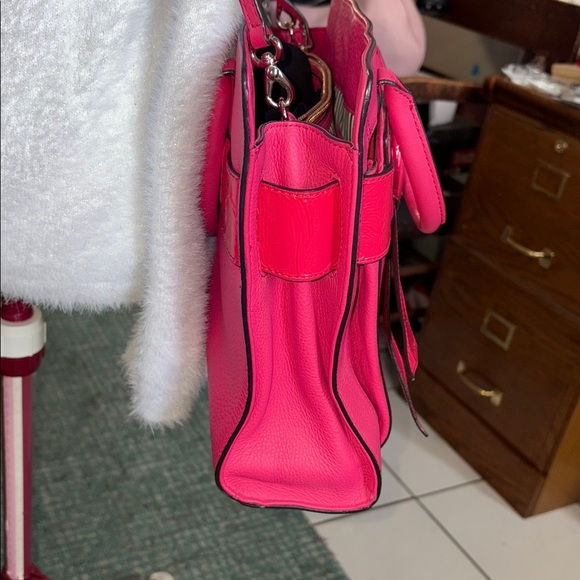 Kate Spade Satchel Crossbody bag
Leather Bright Pink/ bow front in patent EUC - Picture 5 of 17